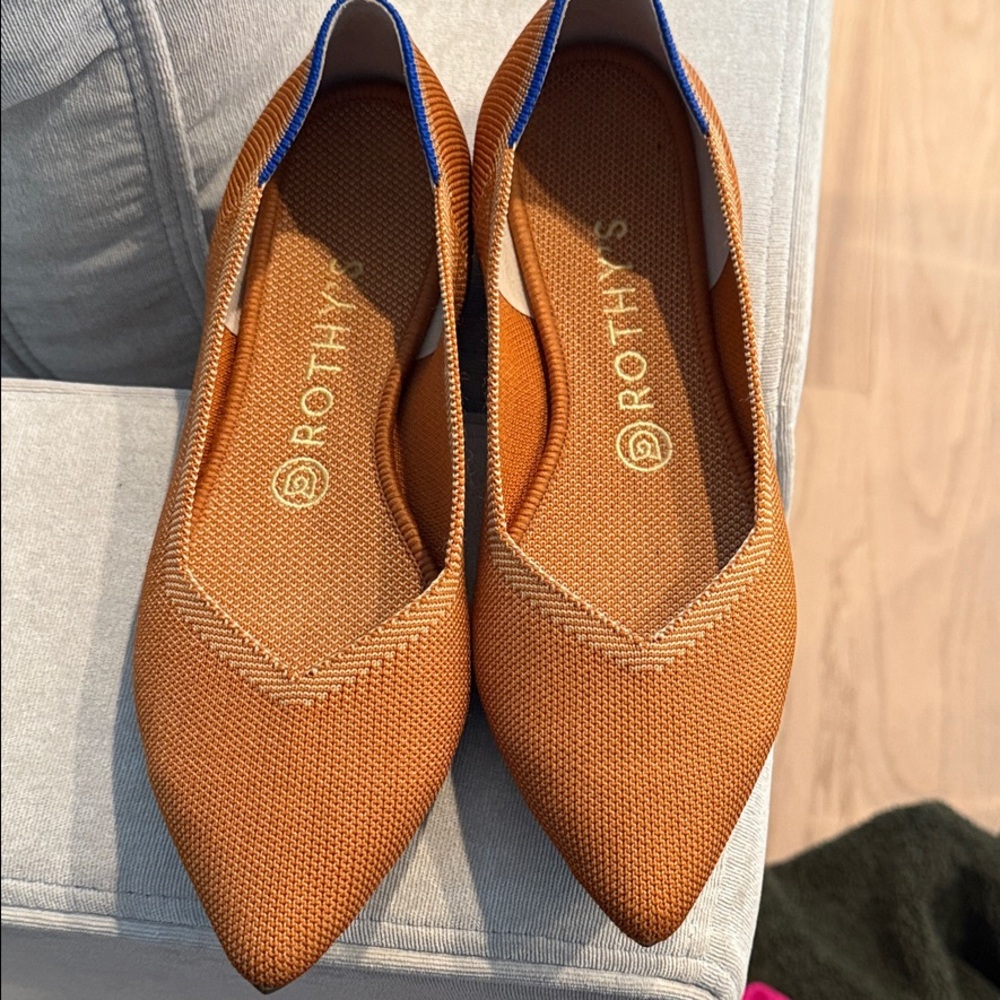 Rothy's Vibrant Orange Flats with Blue Accents